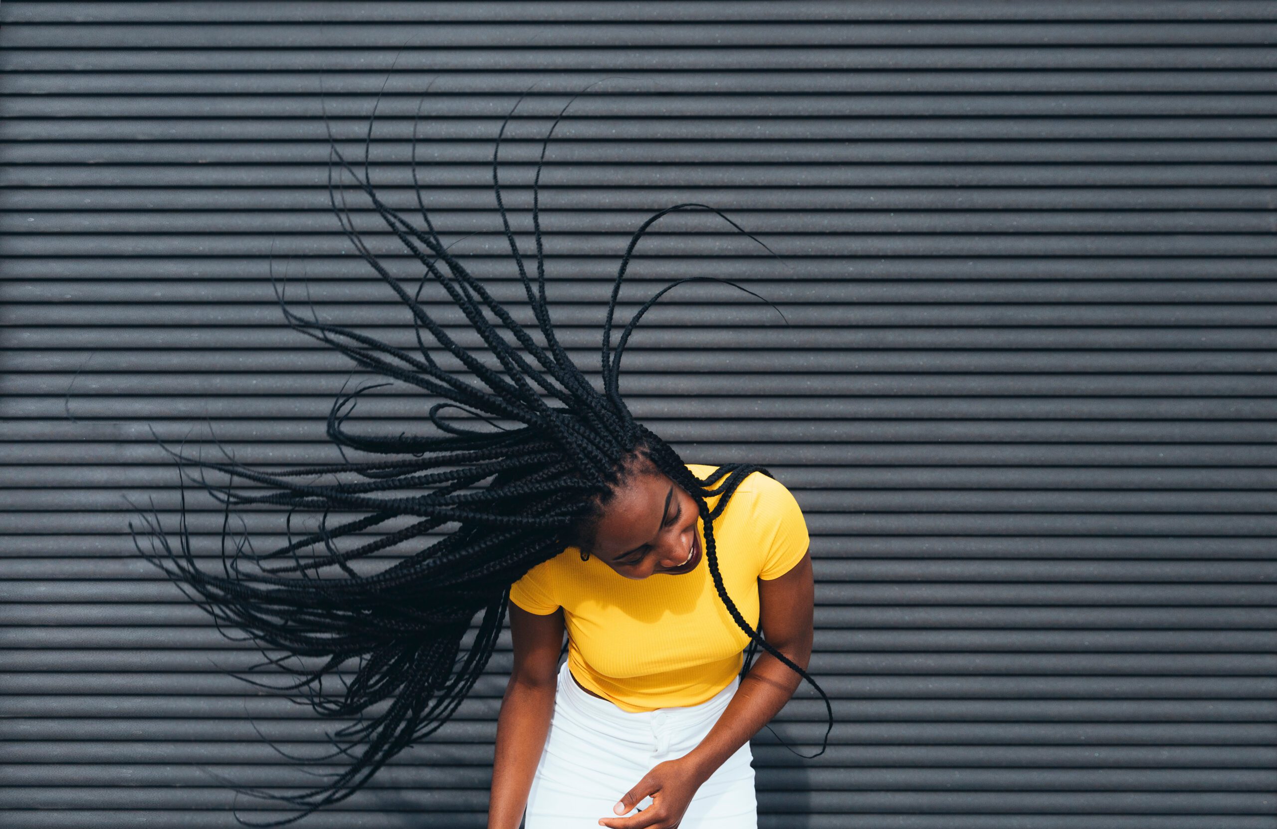 Woman Waving Her Dreadlocks Hair